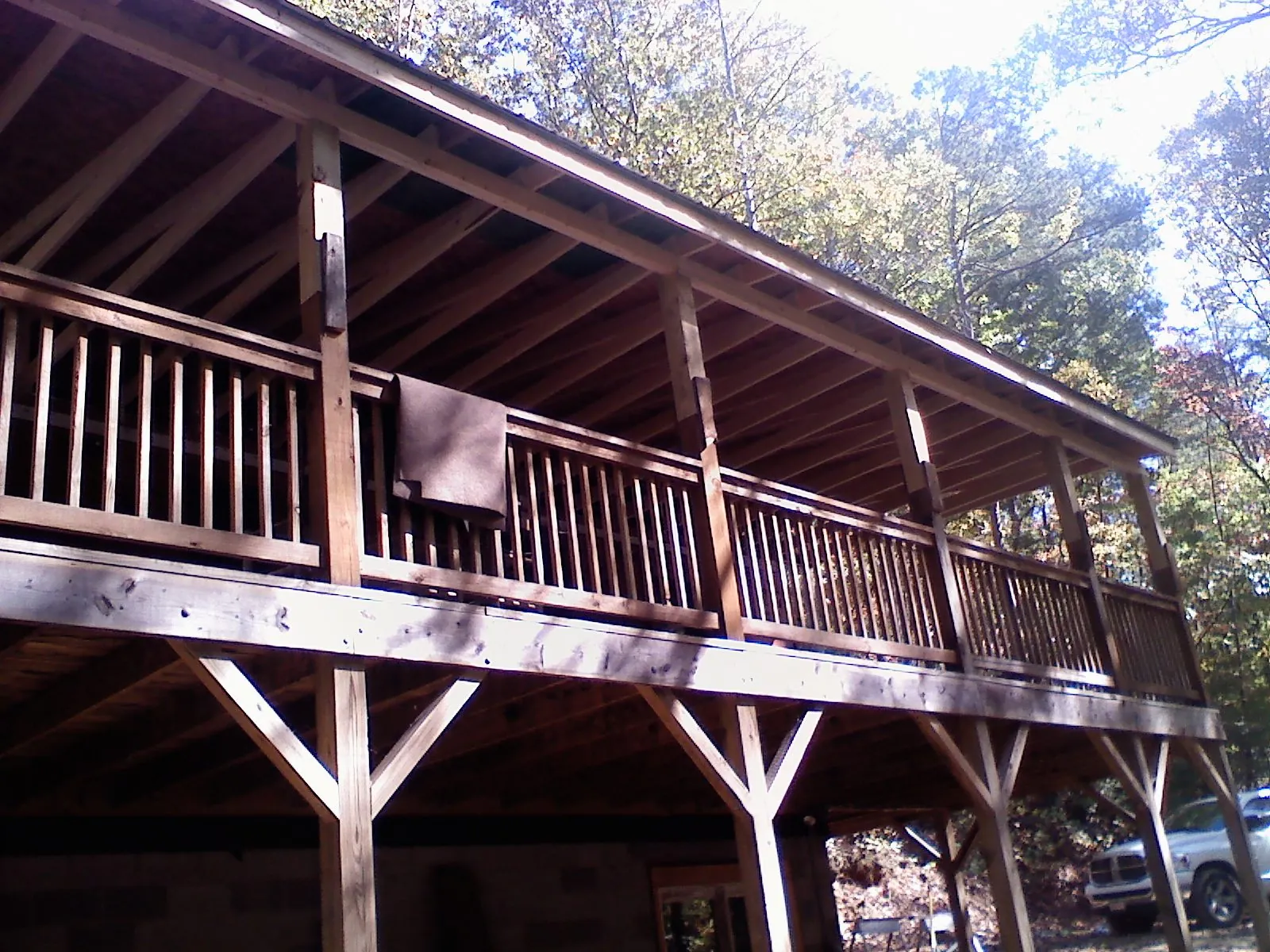 Timber framing under a new elevated porch and deck — Roof Leak Repair in Nesconset by Roofing Brothers